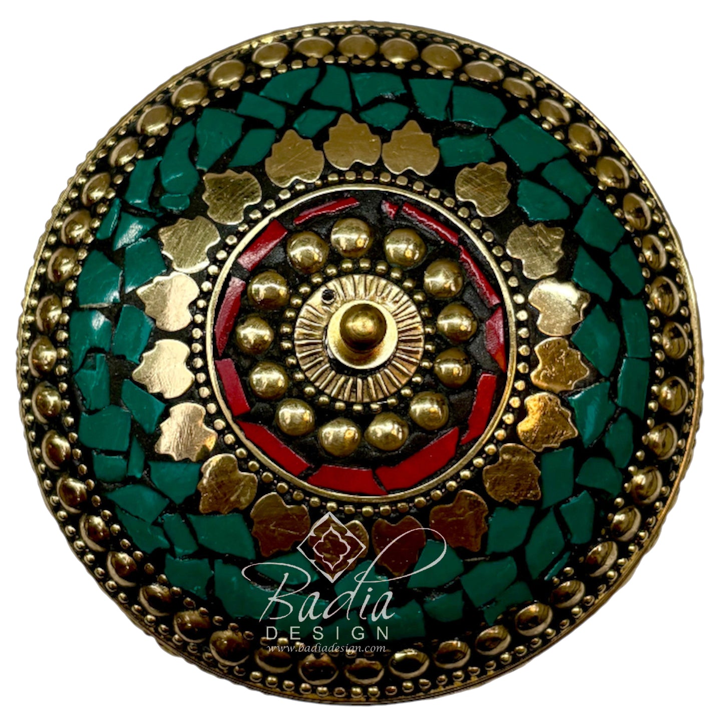 Aerial View Decorative circular object with gold, green, and red colors on a white background