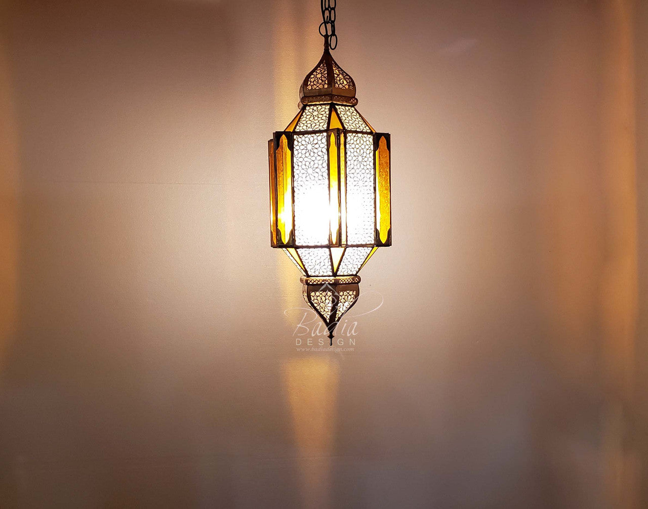 Intricately Designed Brass Chandelier with Amber Color Glass