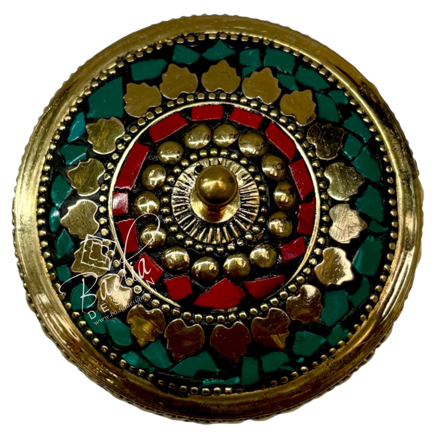 Aerial View of Decorative circular object with gold, red, and green colors on a white background