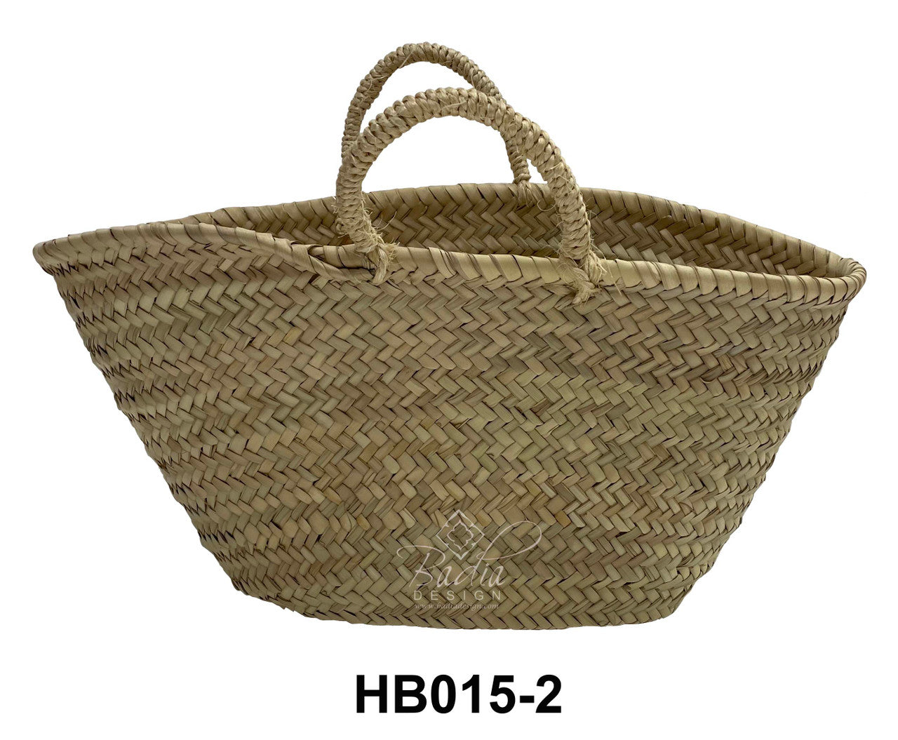 Woven basket with handles on a white background, featuring the brand &
