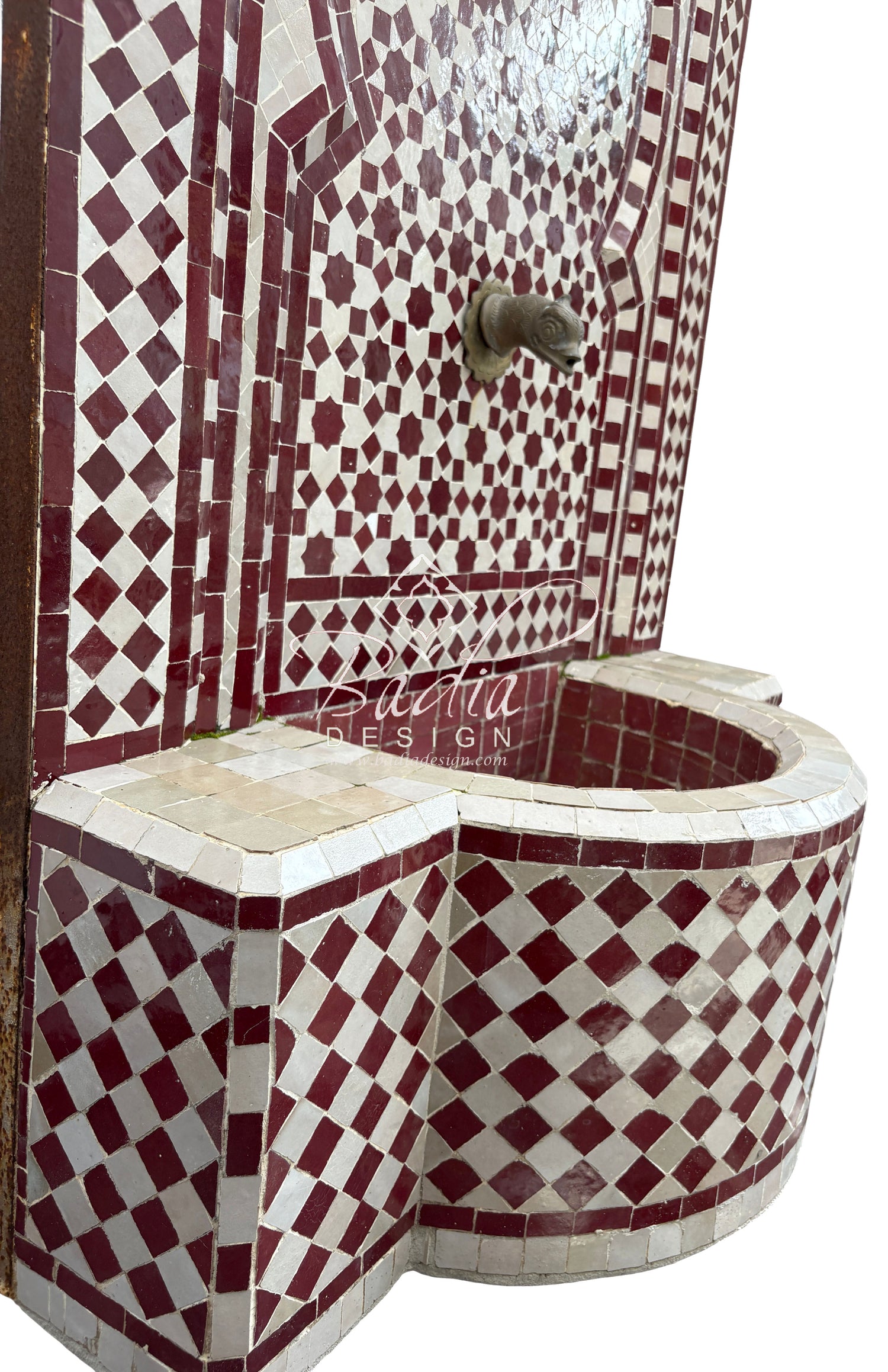 Mosaic-tiled corner unit with geometric pattern, featuring the brand &