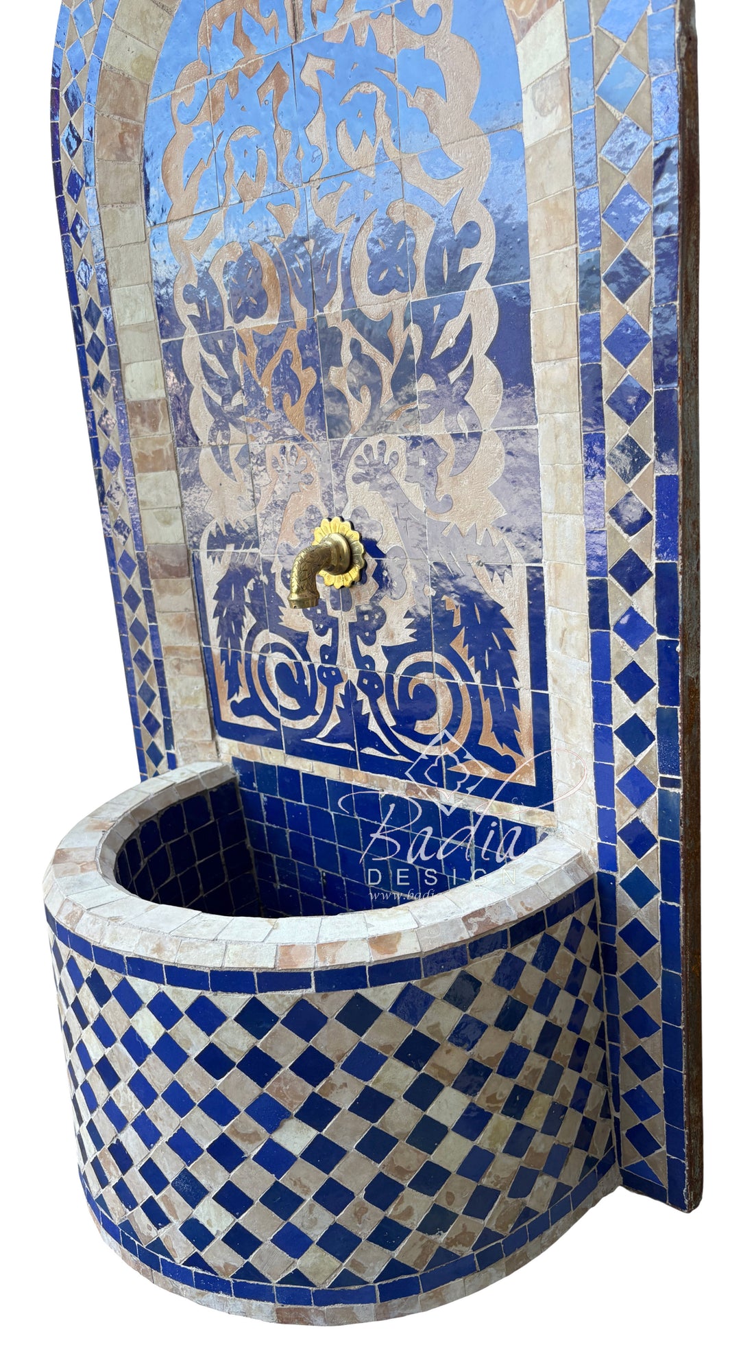 Decorative mosaic fountain with blue and white patterns on a white background