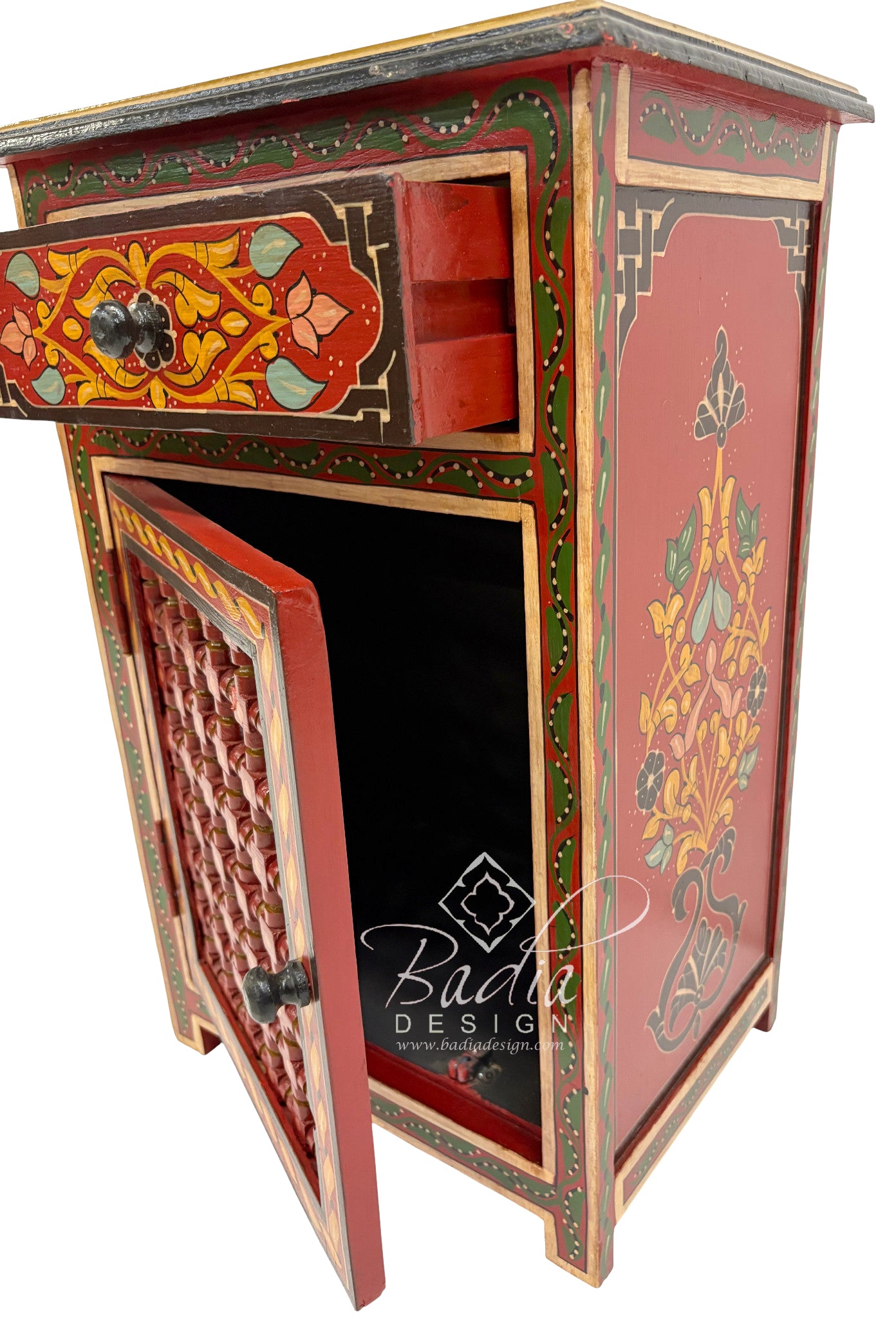 Decorative wooden cabinet with intricate designs and open door, featuring the Badia Design logo.