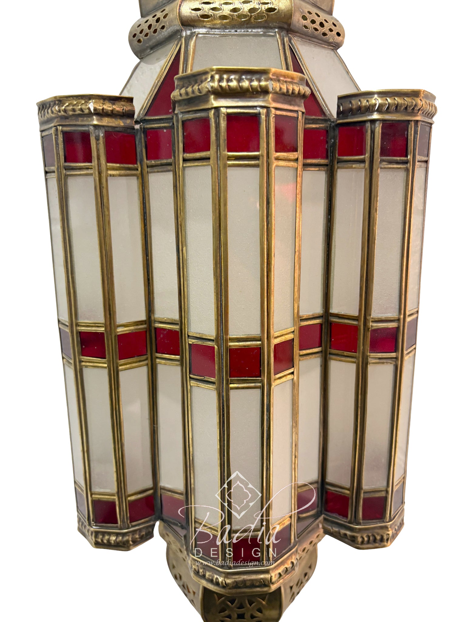 Decorative lamp with red and gold accents on a white background