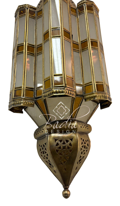 Decorative wall light fixture with intricate design and &