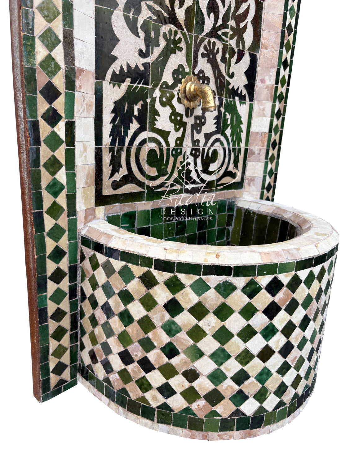 Decorative green mosaic fountain with intricate patterns and a checkered design.