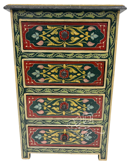 Decorative wooden chest of drawers with floral patterns on a white background