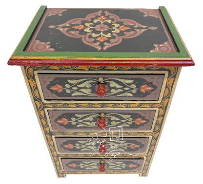 Decorative wooden chest with intricate patterns and red handles on a white background