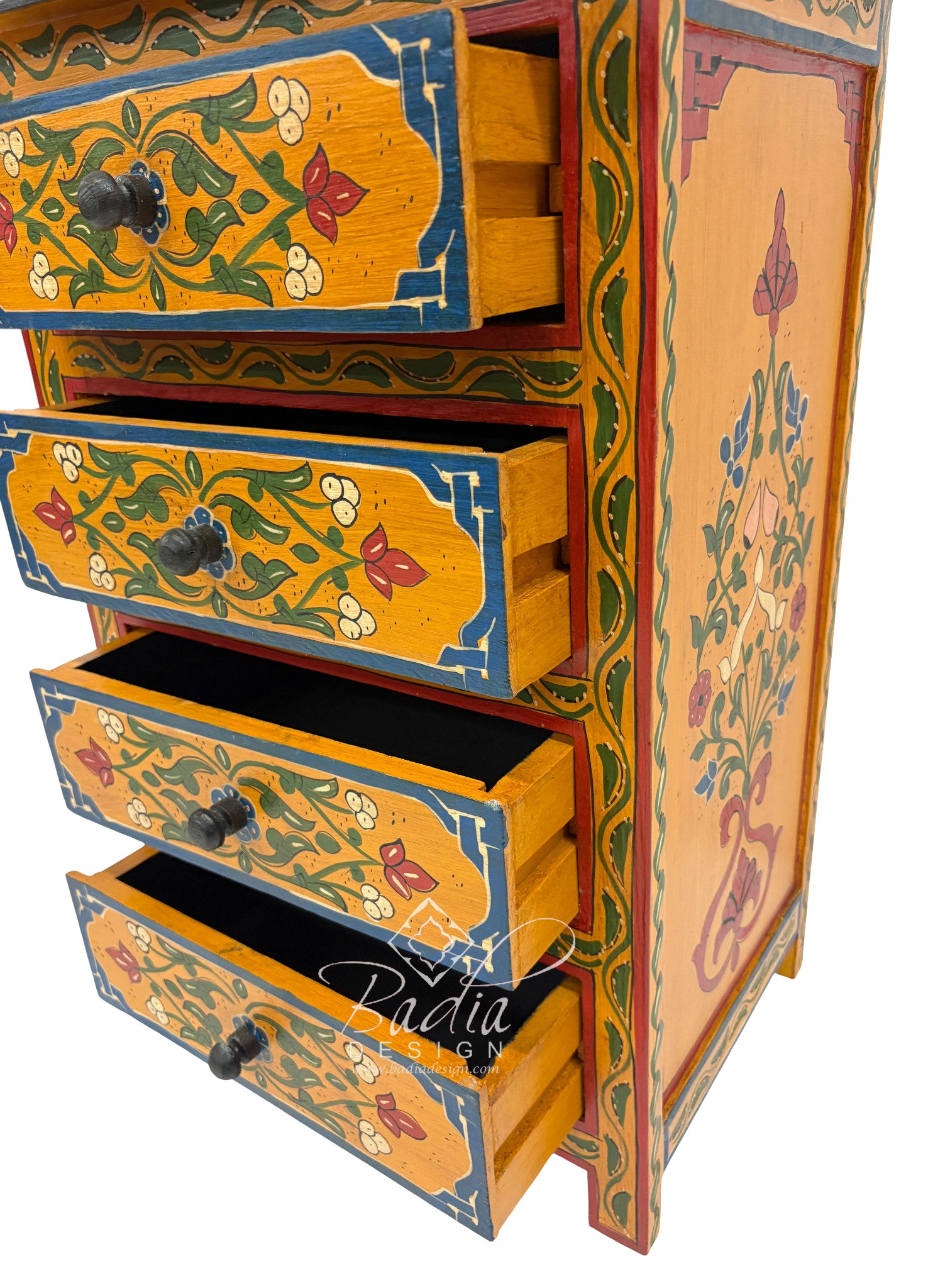 Decorative wooden chest of drawers with floral patterns on a white background