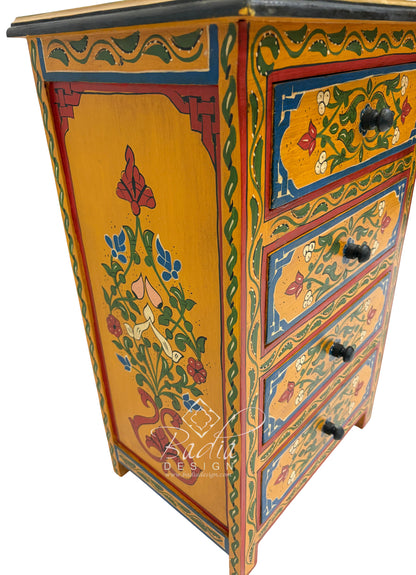Yellow Decorative chest of drawers with floral patterns and colorful design on a white background.