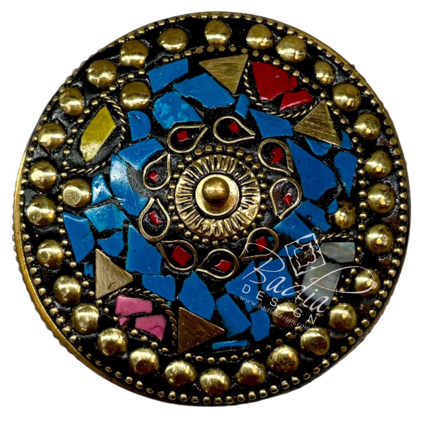 Decorative button with mosaic design and gold accents with areal top view on a white background