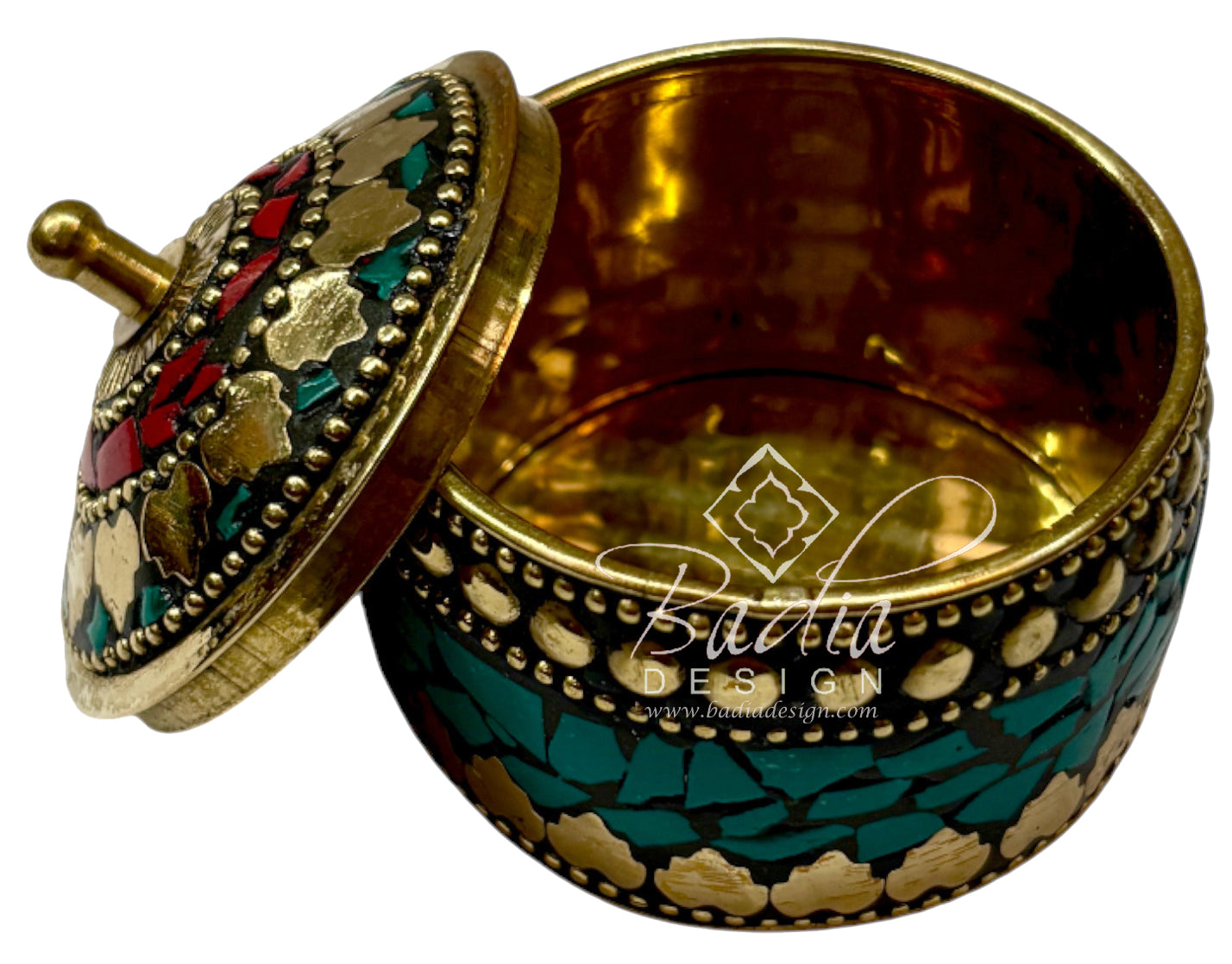 Decorative brass box with intricate patterns and colorful open lid