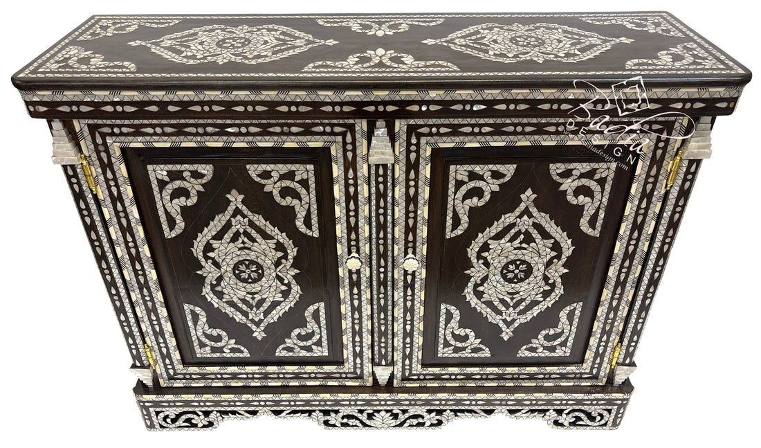 Decorative black cabinet with white patterns on a white background