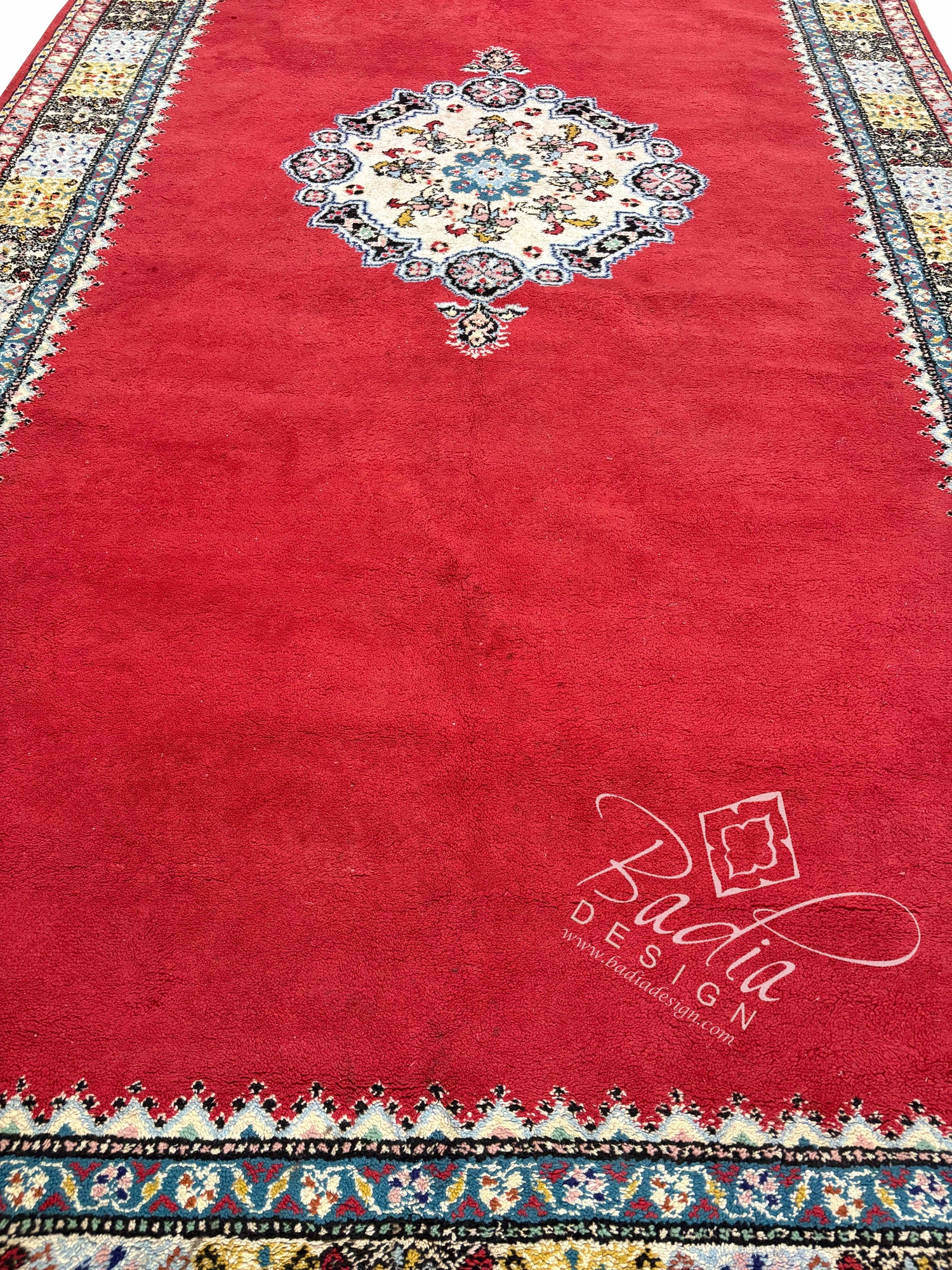 Red Runner Rug with Multicolor Geometric Designs