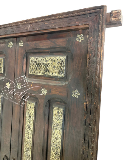 Handcrafted Wooden Door with Ornate Metal Accents